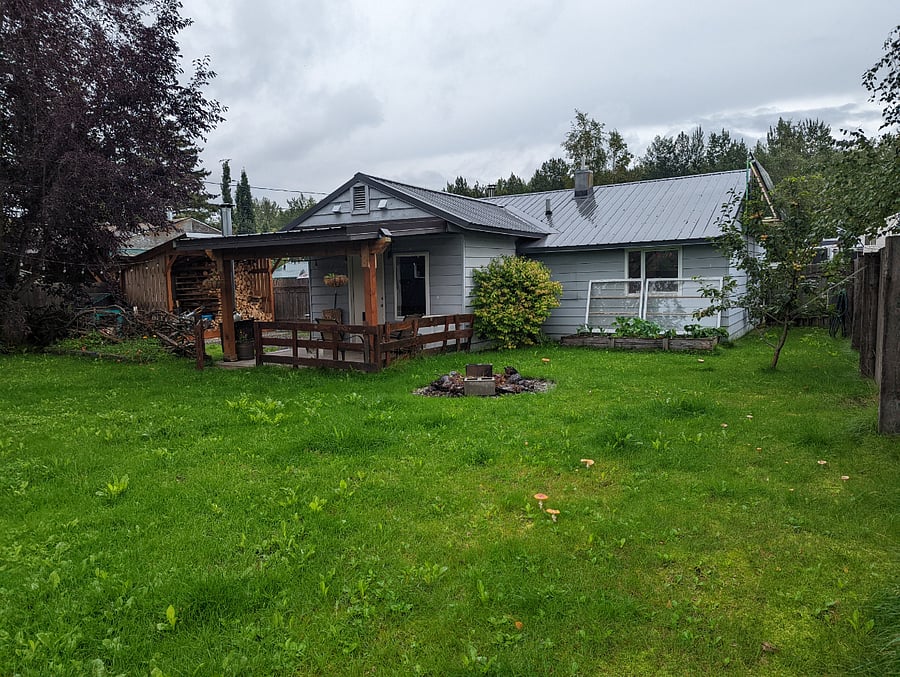 back yard is fully fenced in (but does have some squeezable holes to be mindful of!)