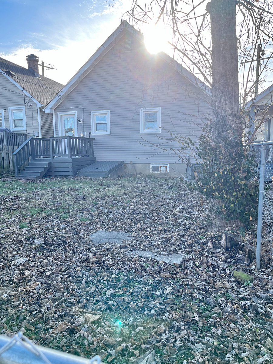Large, fenced backyard for your furry friend.