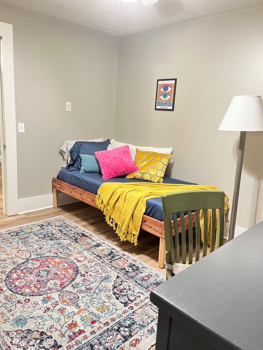 Back bedroom/office with twin daybed and large desk.