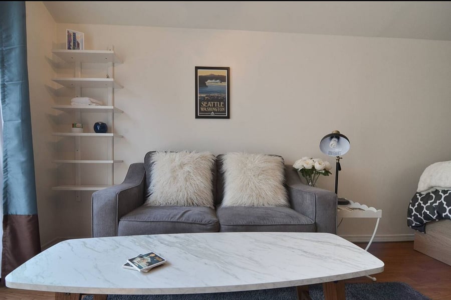 This sofa has been replaced with a full size sofa.