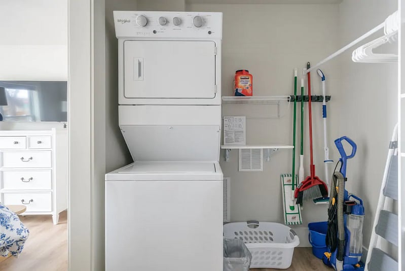 Stackable Laundry Along with Great Storage In Master Bedroom Walk-In Closet.