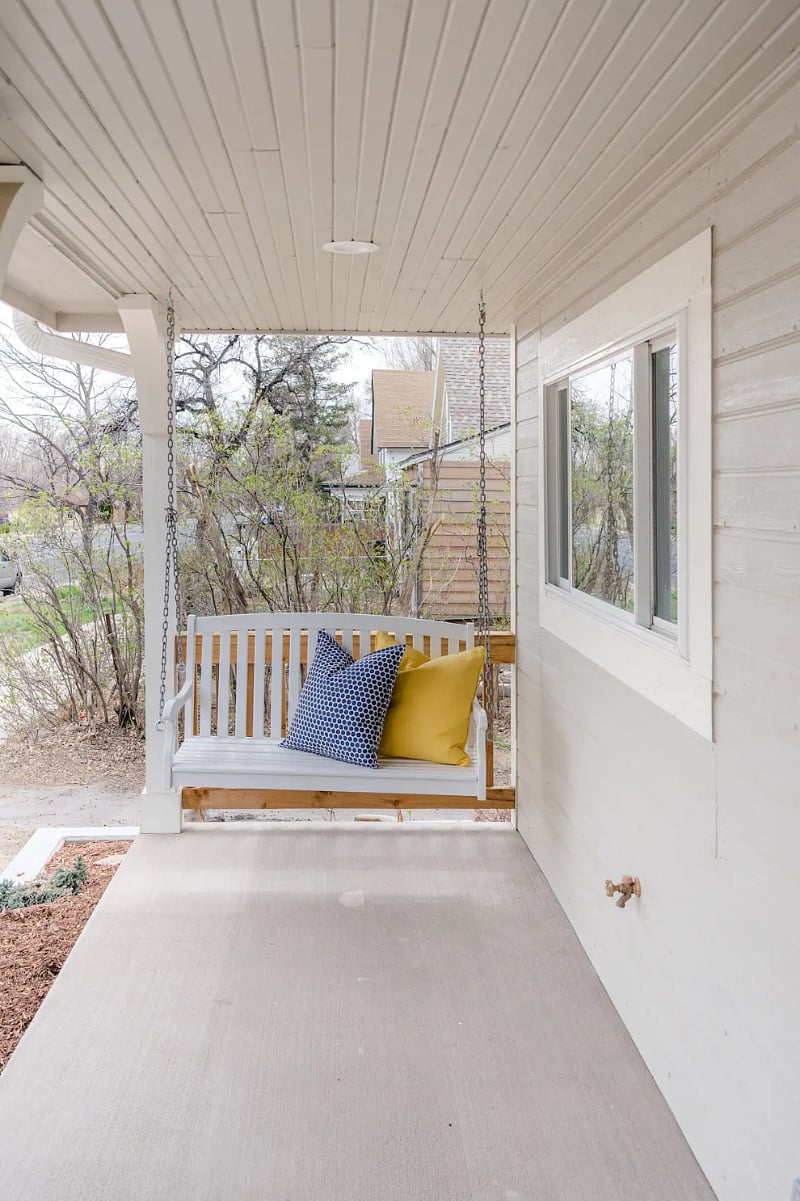 Have a morning cup of coffee or relax at the end of your day in the sweet porch swing.