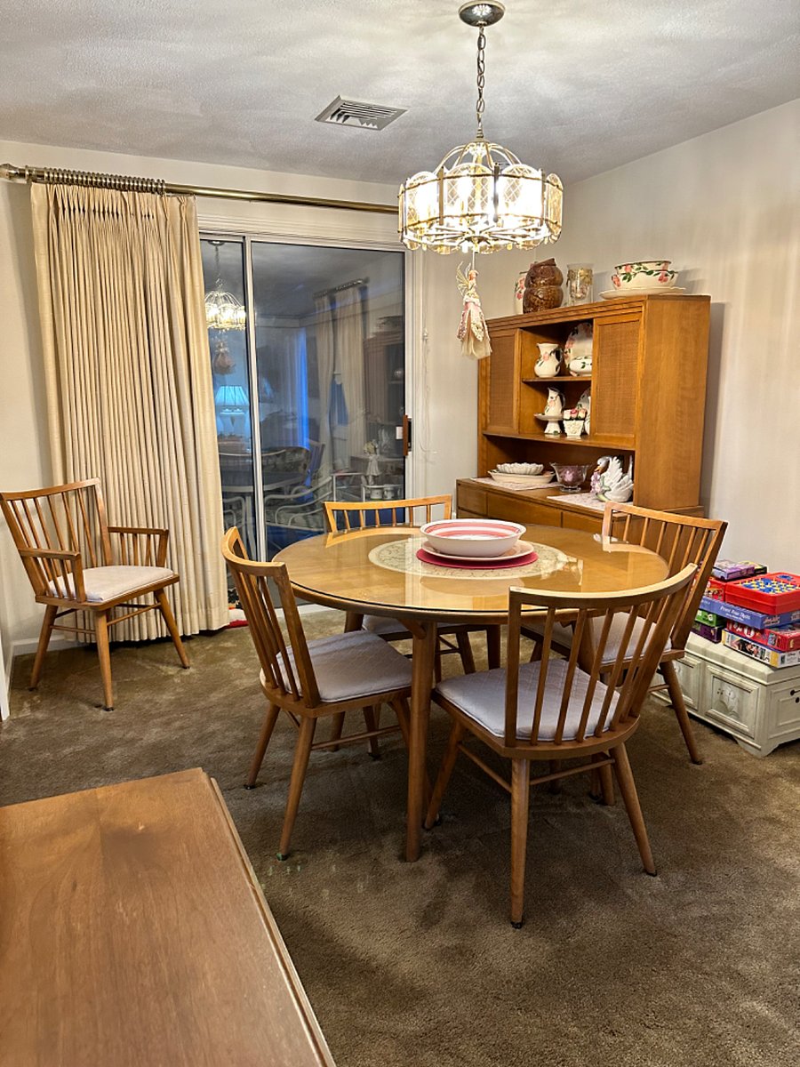Dining room with slider to deck.