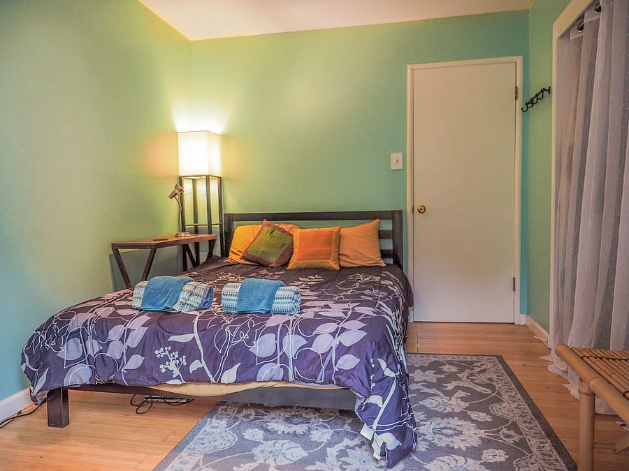 Master Bedroom with outdoor access to the backyard garden