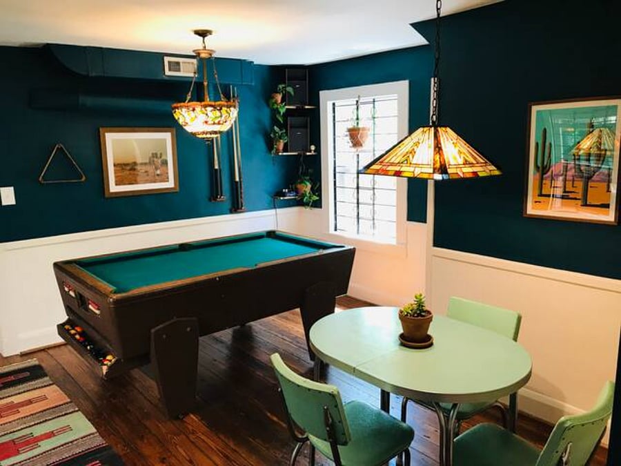 vintage pool table, dining area. Closet space with additional towels, cleaning products, linens