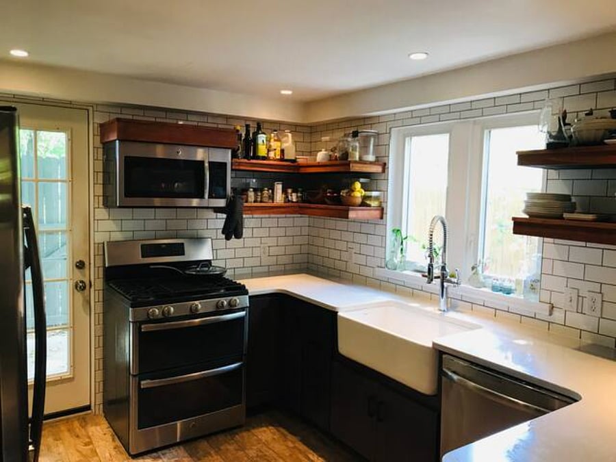 newly updated kitchen with dishwasher, double oven, toaster, rice maker, coffee maker, coffee grinder and extensive kitchen utensils and dining ware.
