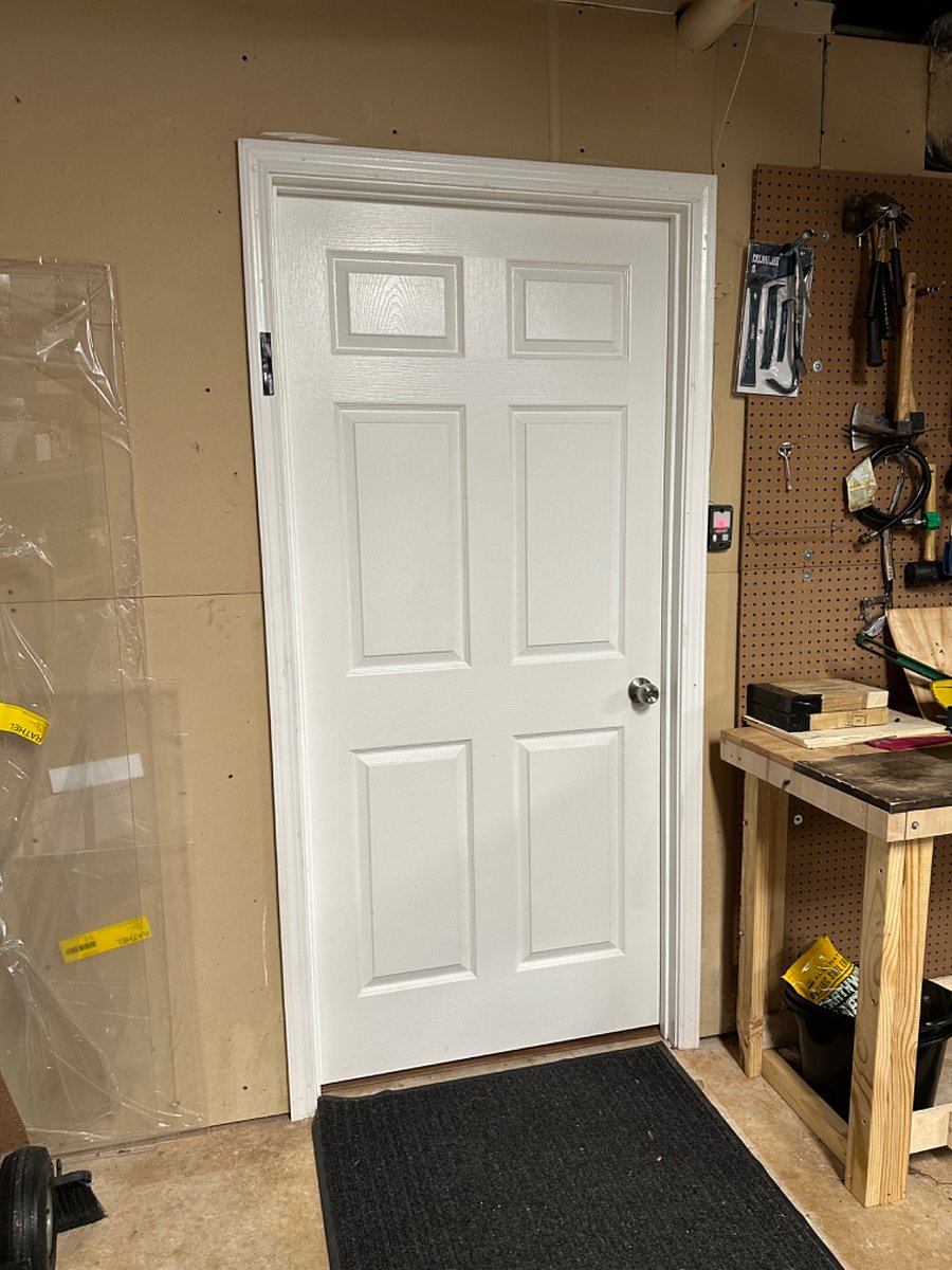 Entrance door to unit is from inside garage