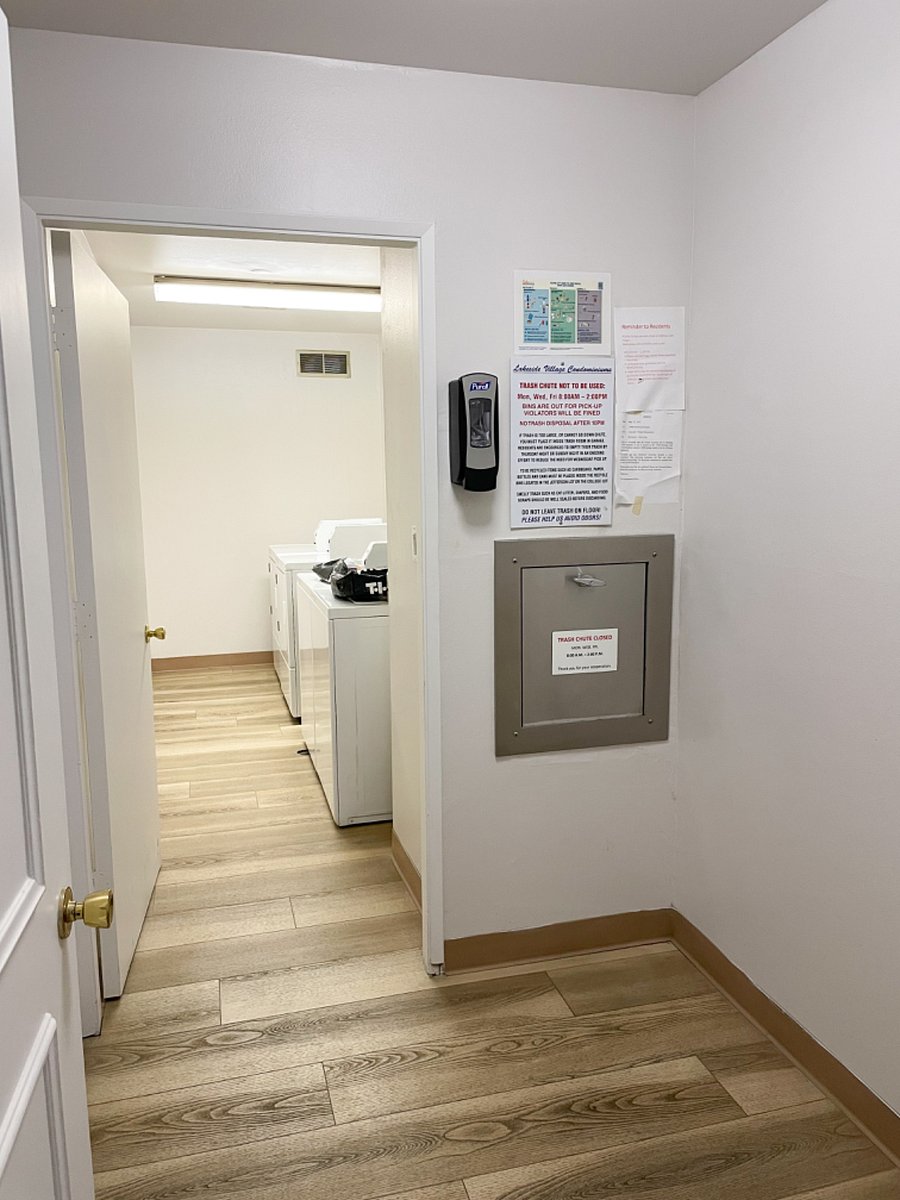 2 washers and dryers with trash shoot located on same floor