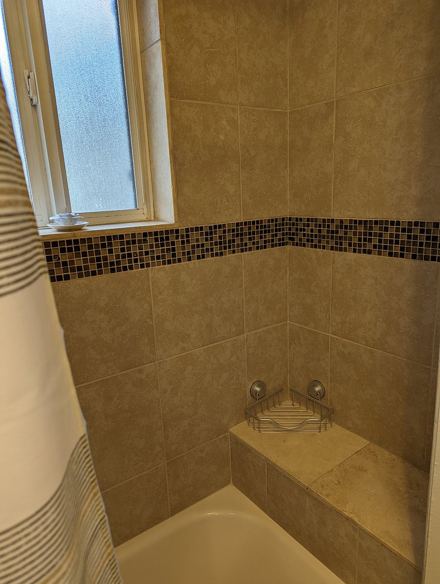 Bathroom/seat/soap and shampoo container