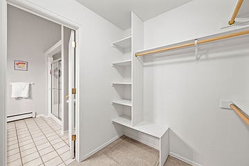 Master bath from walk in closet