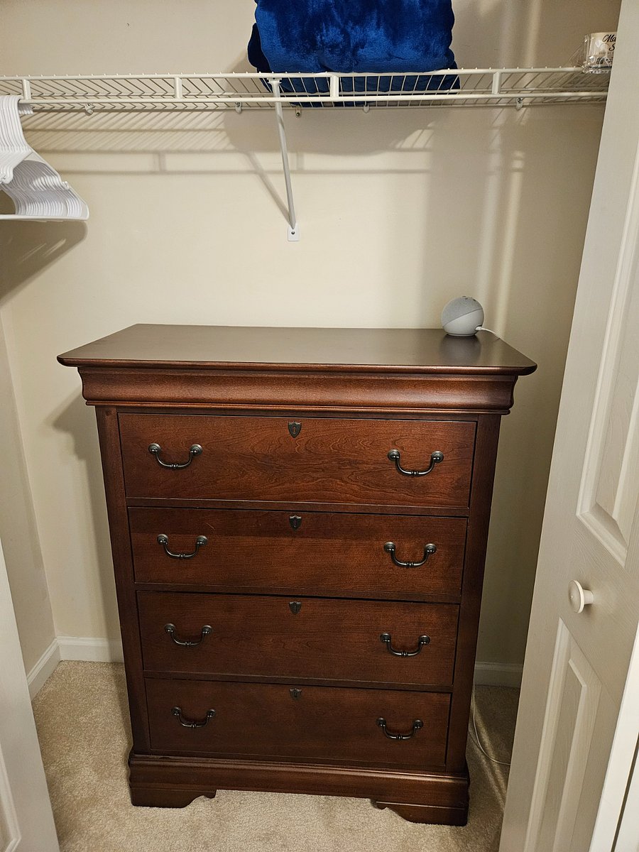 Chest of drawers in closet, in the rear bedroom if desired.