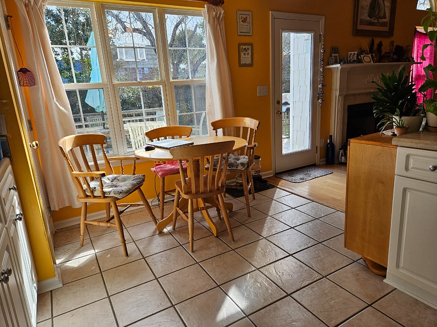 The kitchen has a round table that seats 4 and overlooks the deck and rear garden/yard.