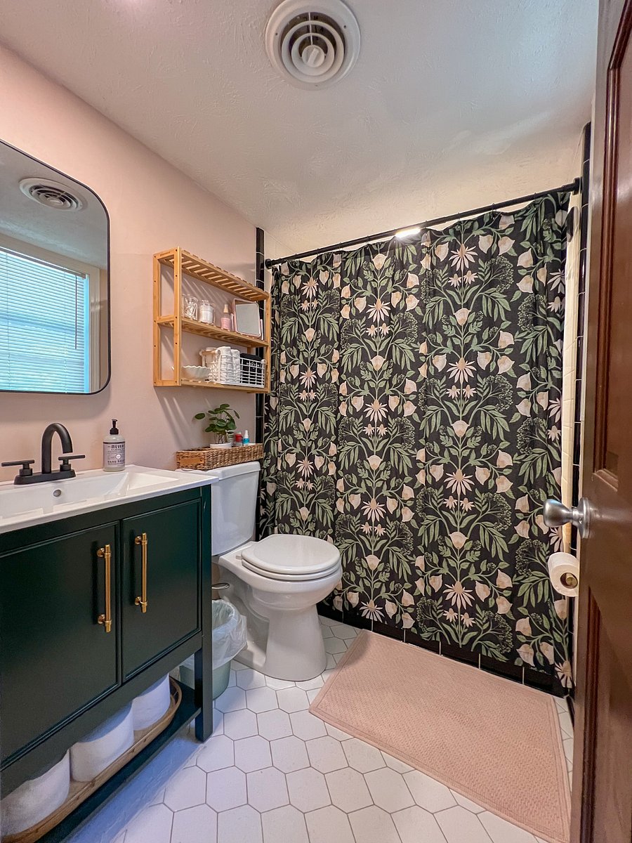 Some modern touches have been added to the bathroom, including a built in medicine cabinet mirror for additional storage.