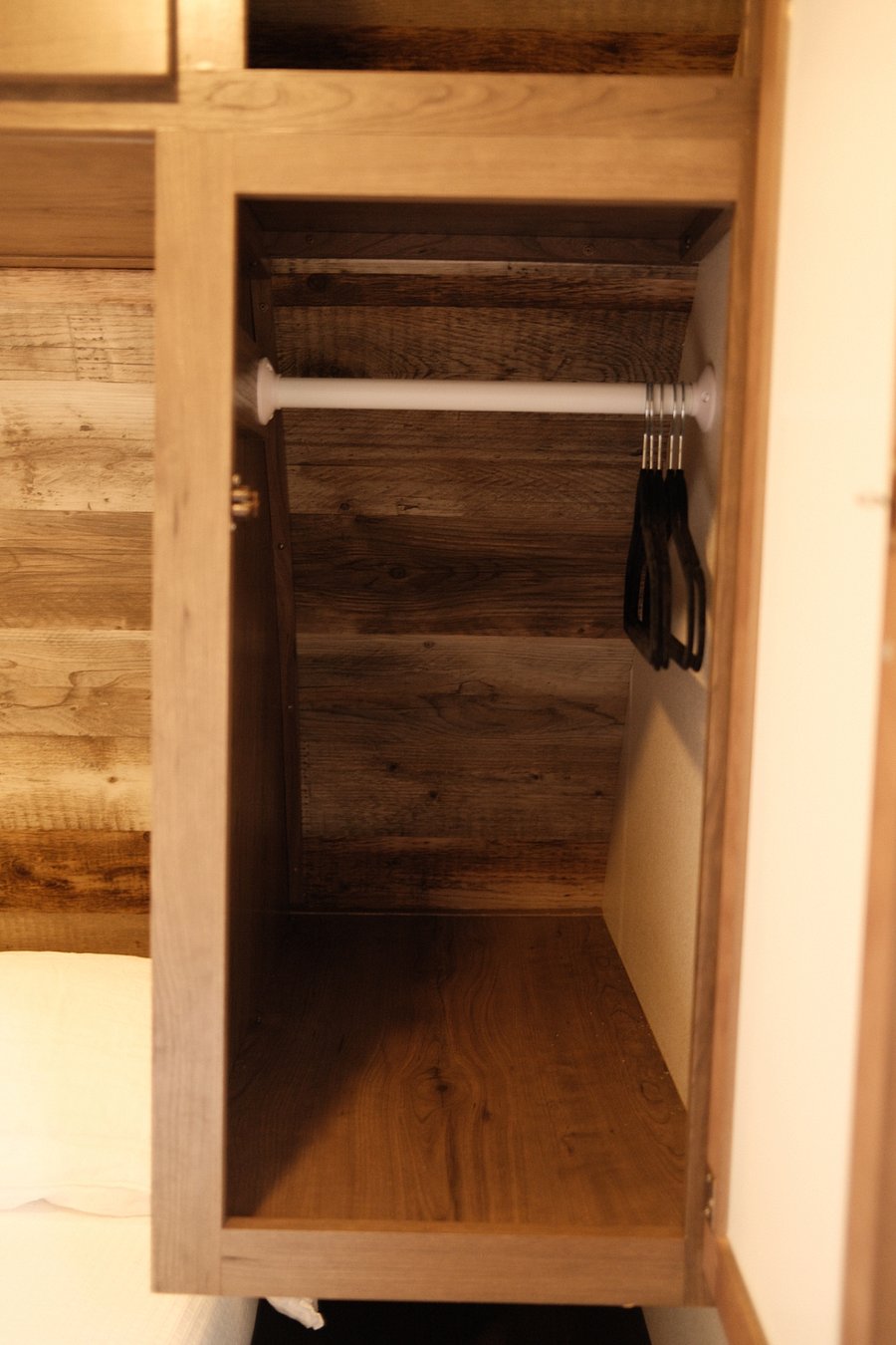closet space, located on both sides of the bed