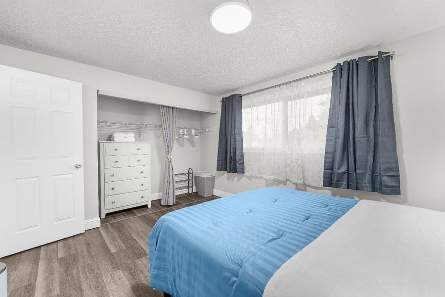 Bedroom 1 with dresser and closet