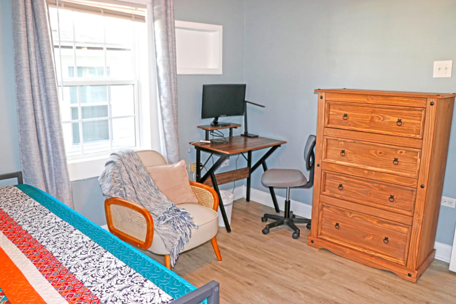 Solid wood 4 drawer dresser.