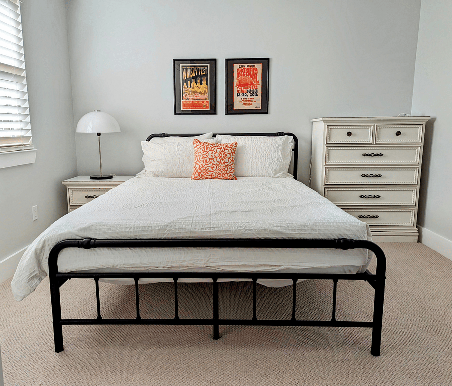Bedroom 1 with new queen bed and quiet place to work