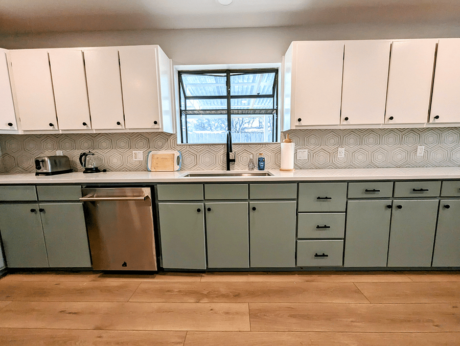 Oversized newly renovated kitchen with large sink and dishwasher