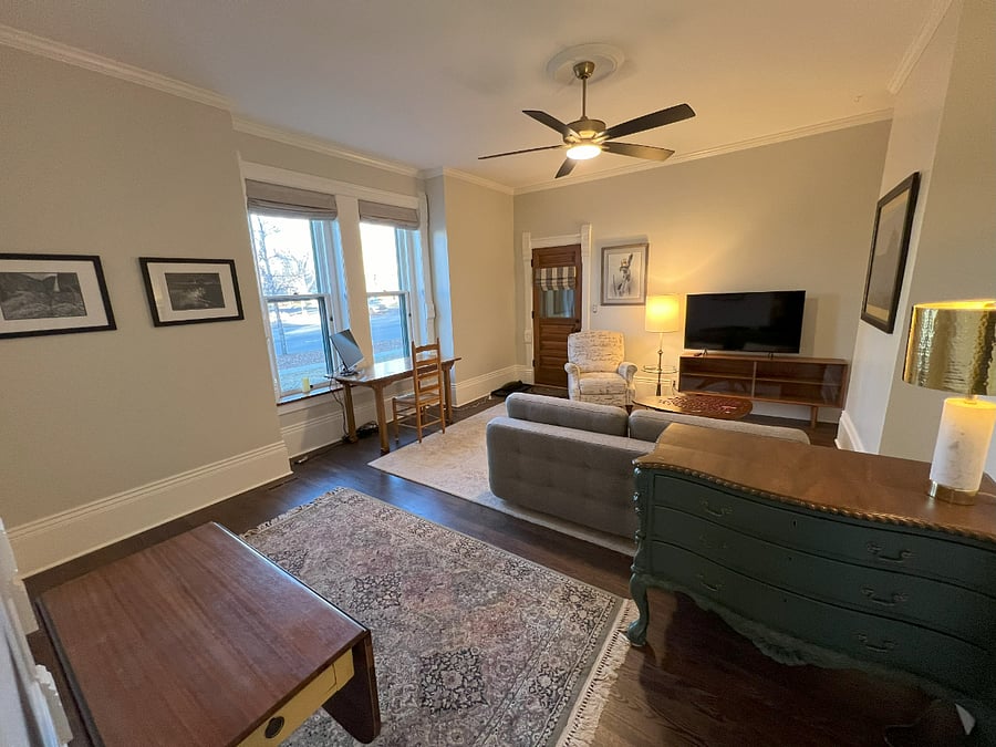 Living room and east entry door