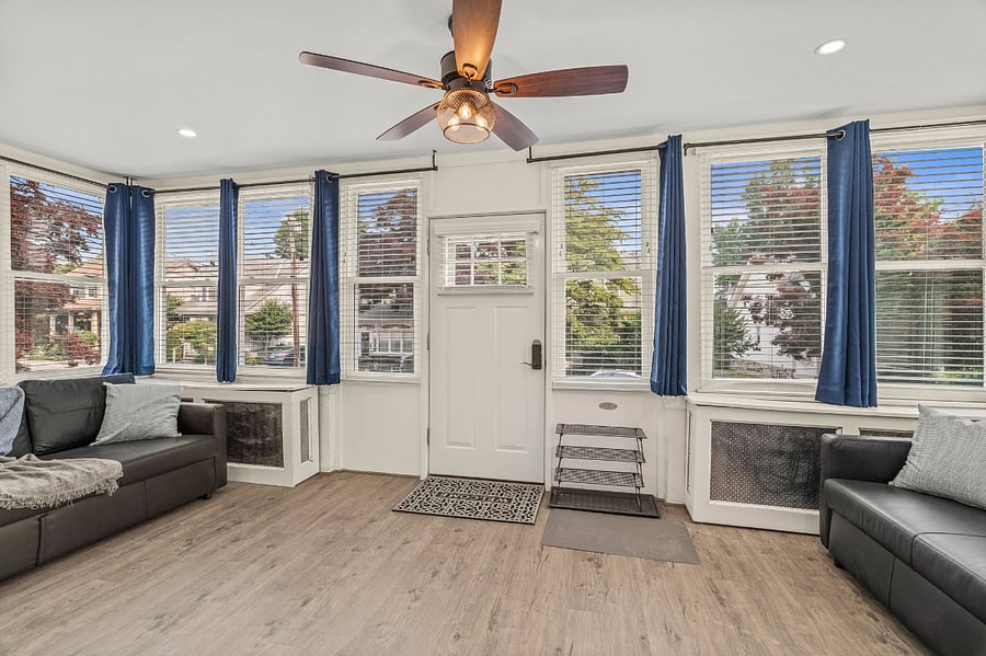 Light & bright front porch to cozy up in - all five sofas throughout the house pull out into sleepers! Ample space for a large family yet intimate enough for a small group, a couple, or even the discerning individual