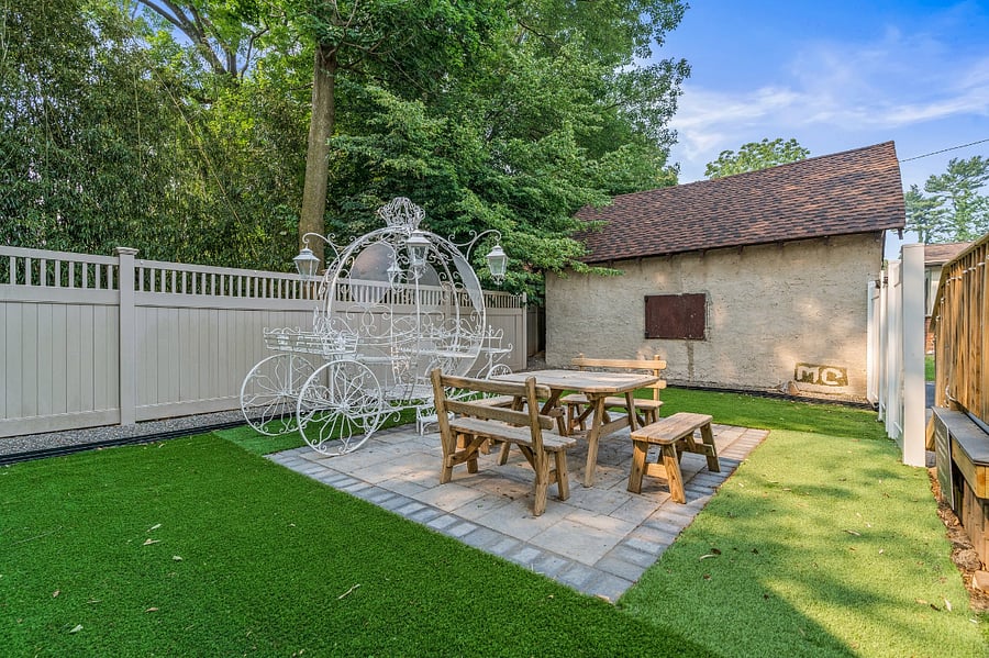 Trees provide shade much of the day. Outdoor lights from the back-porch deck aid by night. Garage interior is off-limits to guests. Wondering about the (owner's) initials? A prank trademark by one (power-wash) contractor who did several of our homes!