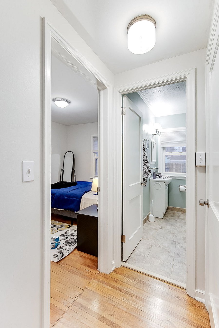 Main Floor Hallway Looking into Full Bathroom