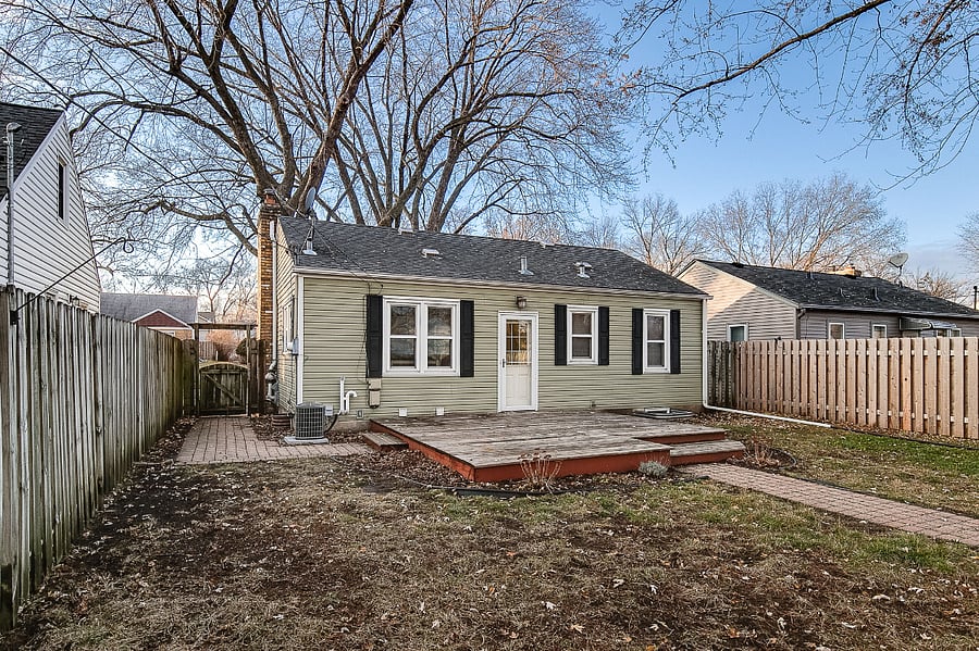 Fully Fenced Backyard with Deck