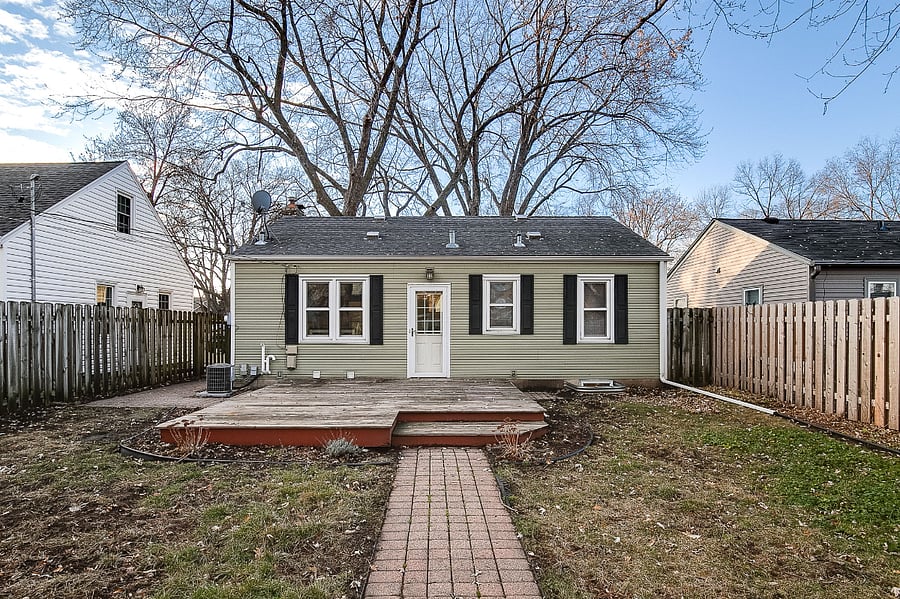 Fully Fenced Backyard with Deck