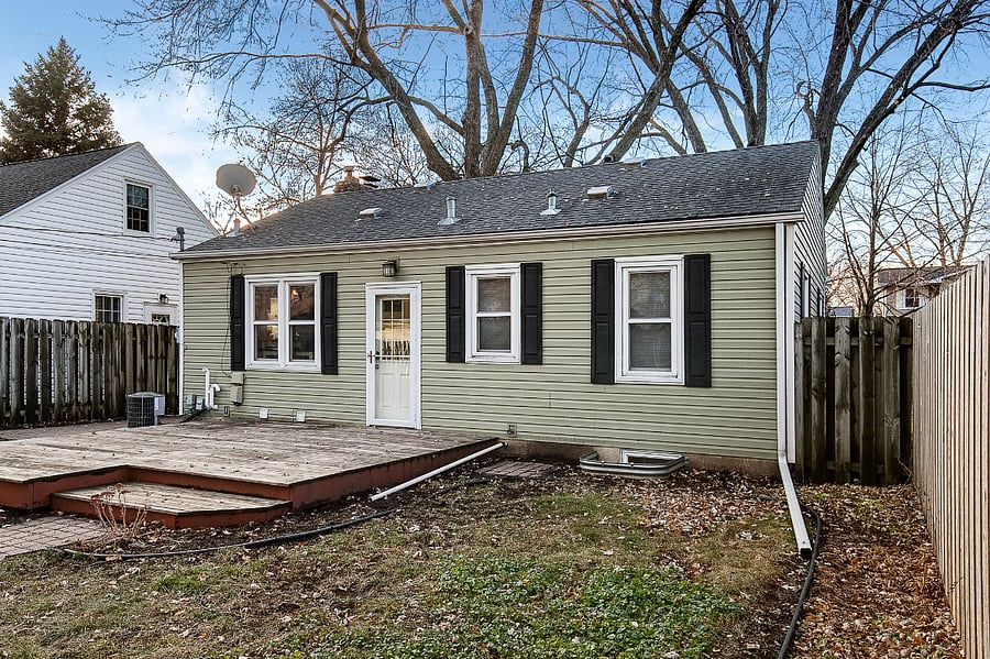 Fully Fenced Backyard with Deck