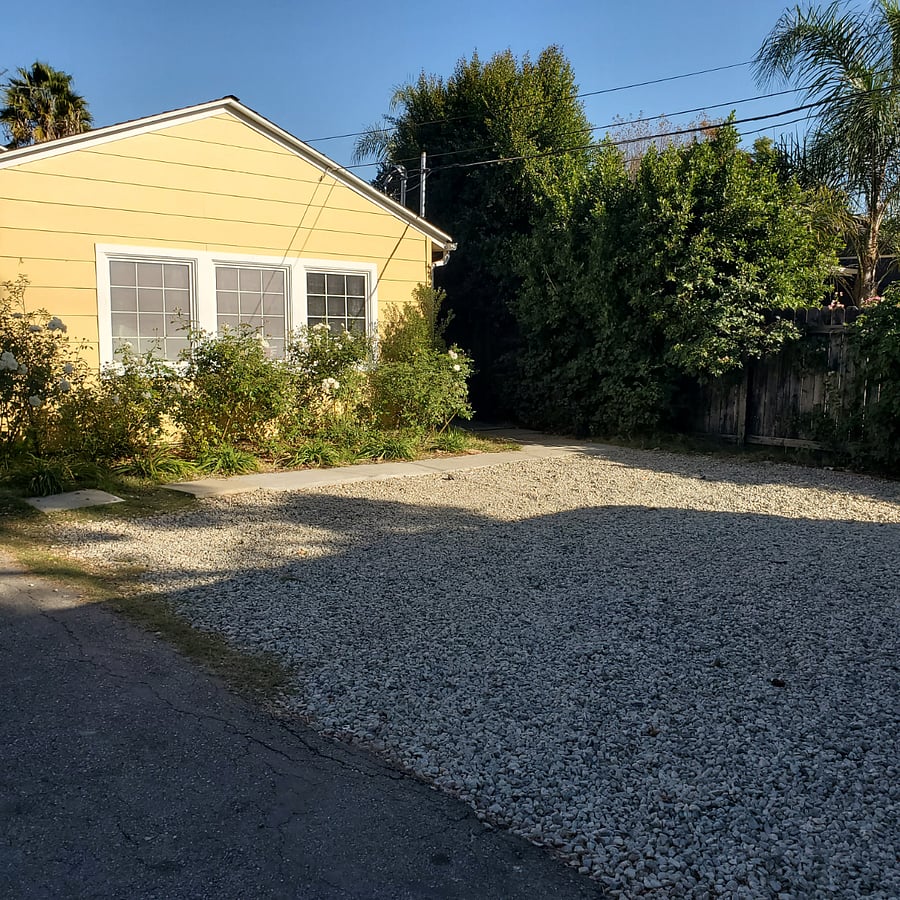 Front main House, Parking next to garage for 1 car next to garage