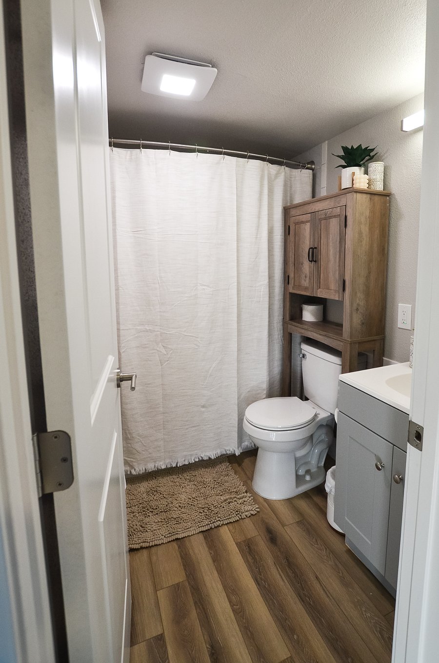 Full bathroom with shower and tub