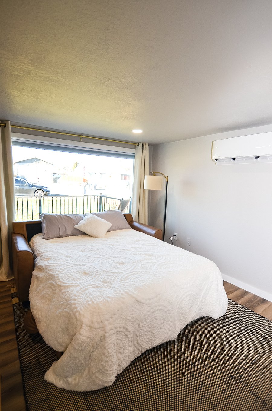 Easy pull out bed in living room with memory foam