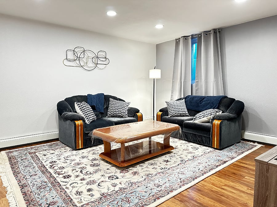Living room area with Couches and Coffee Table