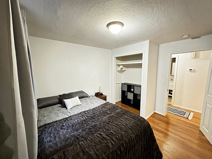 Closet space with storage cubby, shelf and hangers