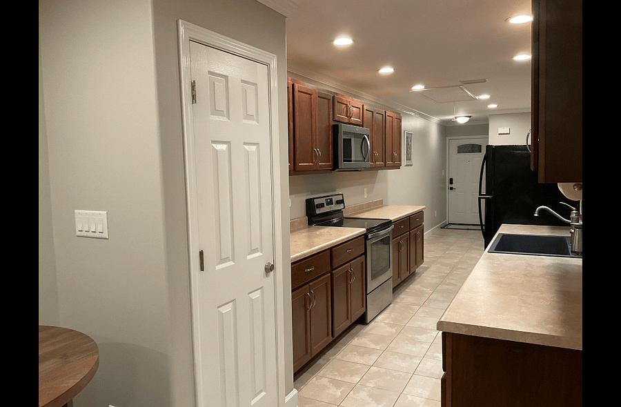 Expansive Galley Kitchen in Shared Common Area. Each of the Suites have a designated upper and lower cabinet for storage of personal food items.