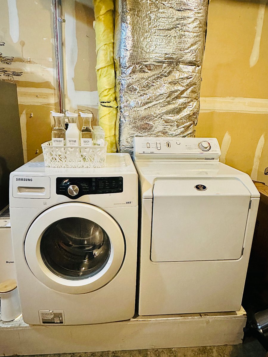 Washer and dryer in common area (garage)