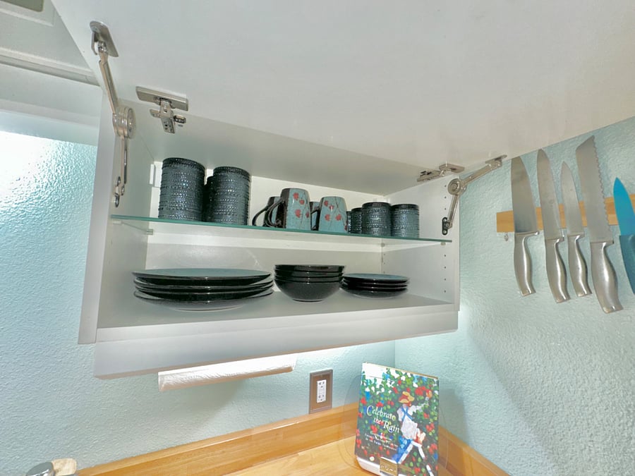 Cabinets and drawers are well-stocked