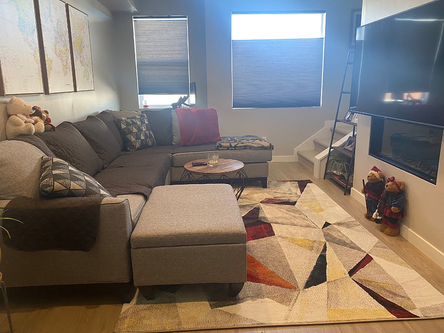Comfy and cozy living area big screen TV sectional couch. Great for just hanging out or watching a movie or resting and putting your feet up.
