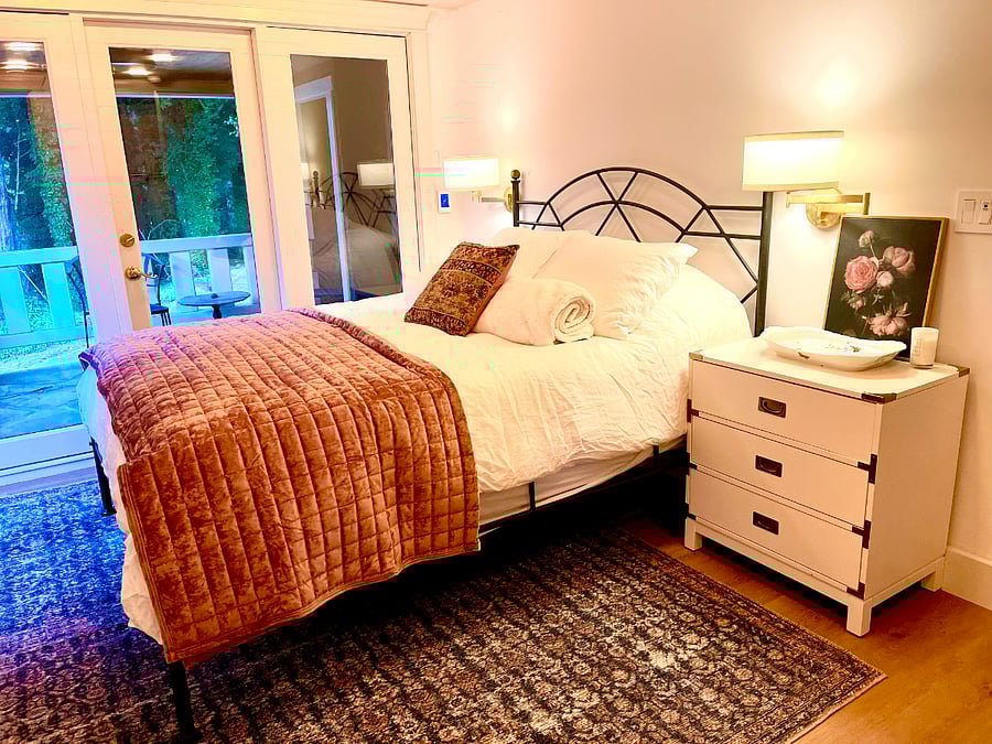 Primary suite downstairs with redwood forest views, wrap around deck/porch.