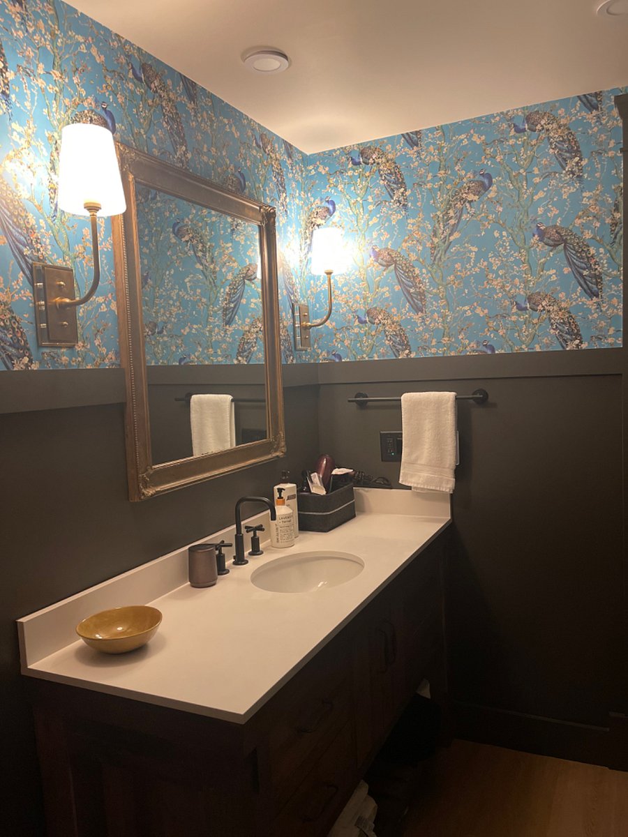 Downstairs hall bath with large vanity, Toto bidet, walk in shower, heated towel bar and storage for pool towels.