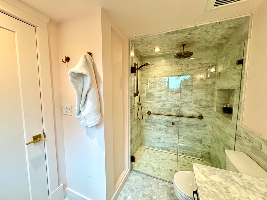 Rain shower and heated floors.