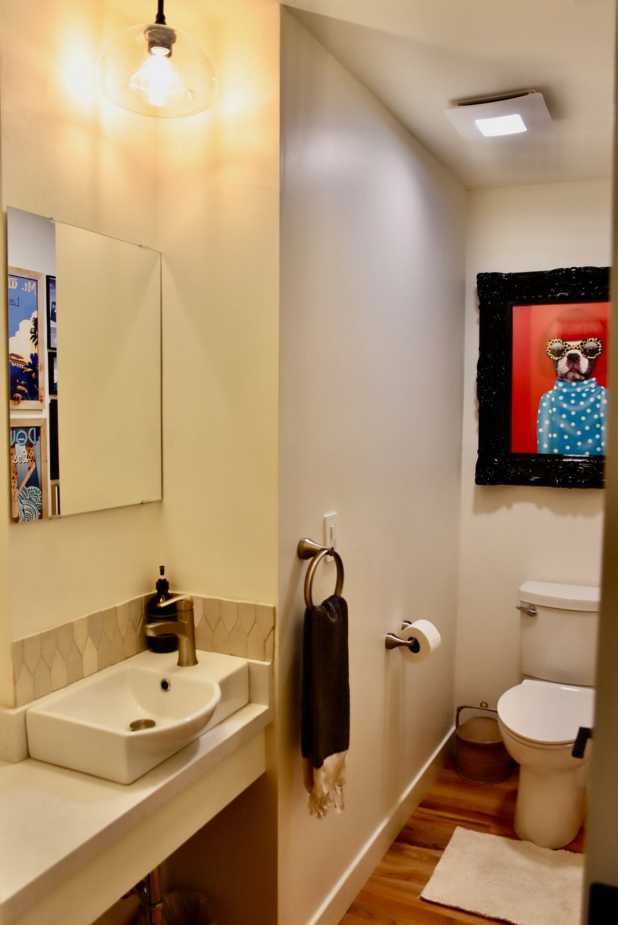 Half bath with dog portrait of Yayoi Kusama. Go check out her Infinity Room installation at the Broad downtown for free!