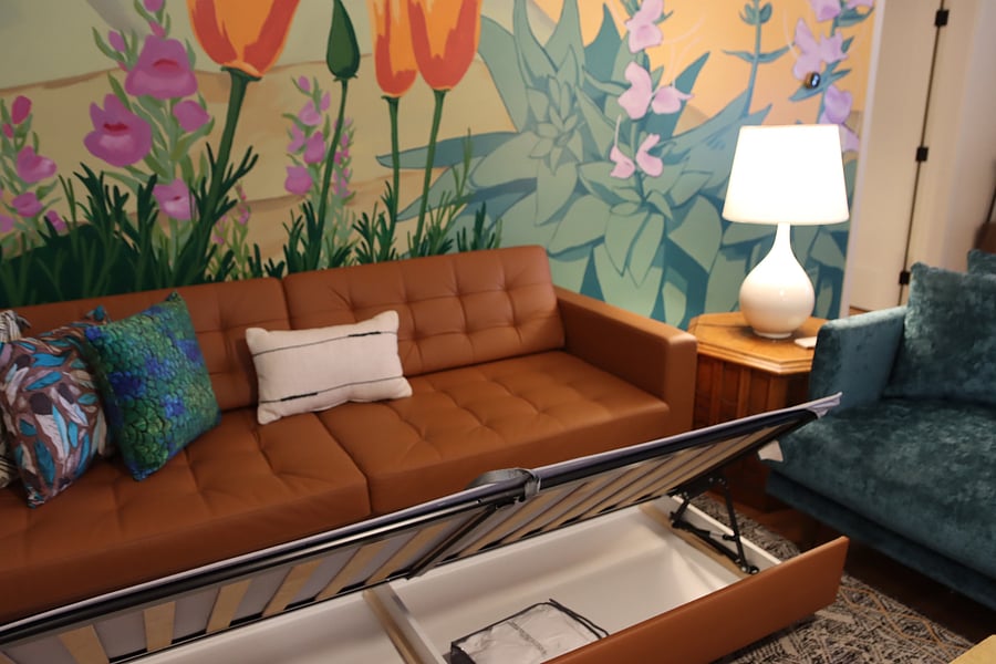This couch has a fold out queen size bed.