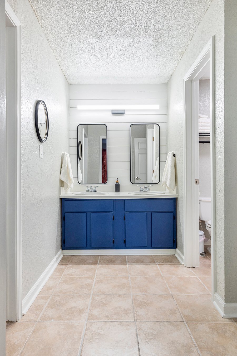Each of the two bathrooms has double vanities