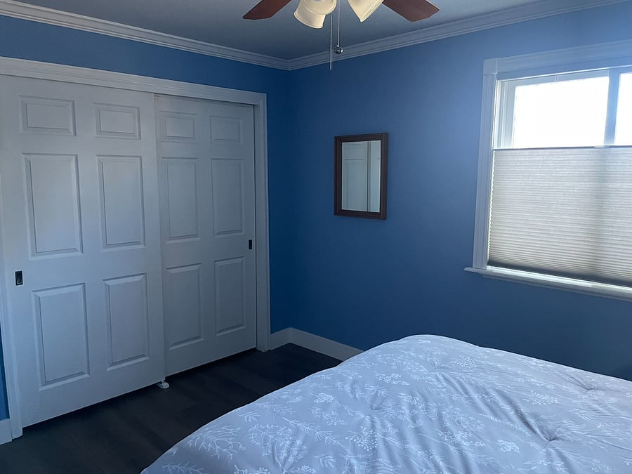 Bedroom 2: Upstairs bedroom with full-sized bed and closet. Bed has 6 storage drawers in addition to the closet space.