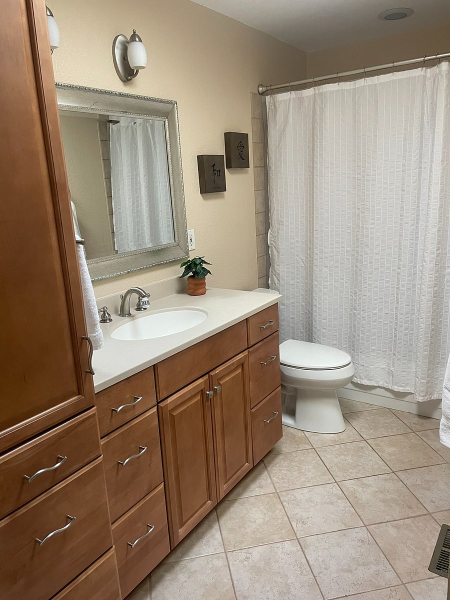 Bath 2: Upstairs bath with tub/shower.