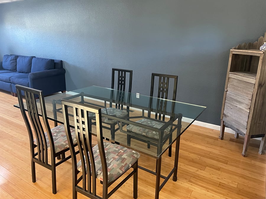 Main-level Dining Room. Table will fit 6 comfortably. Additional chairs available.