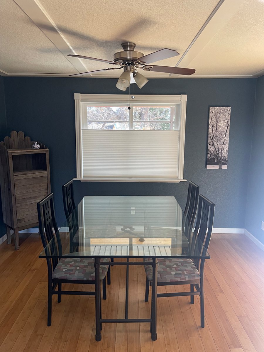 Main-level Dining Room. Table will fit 6 comfortably. Additional chairs available.