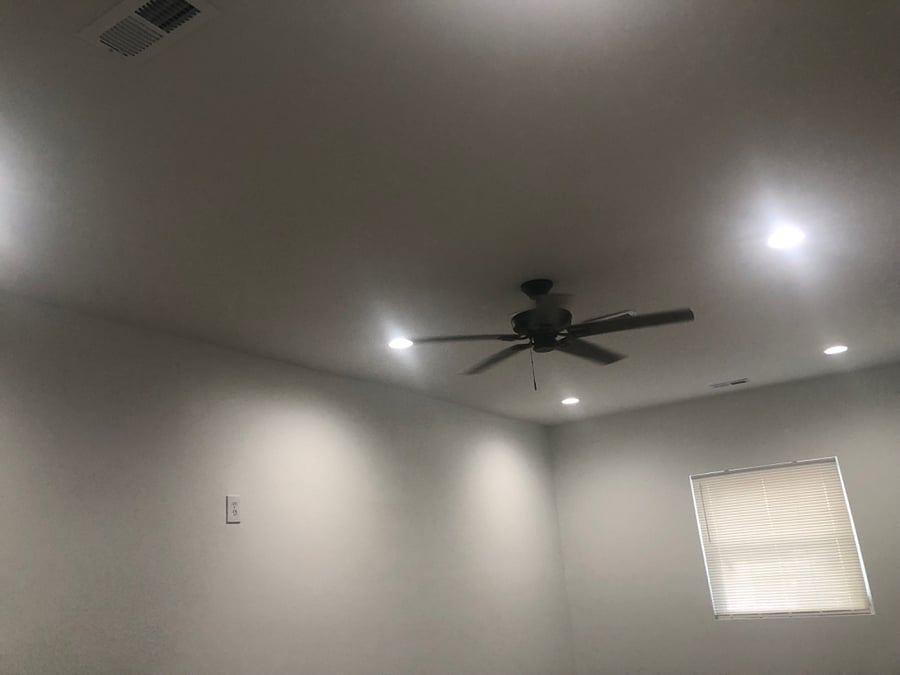 Living room and bedroom have a ceiling fan 