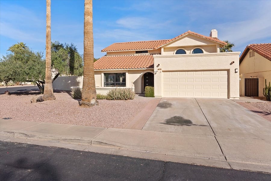 View of front of home.  All homes are well kept because the home is in a HOA.  Private two car garage.  